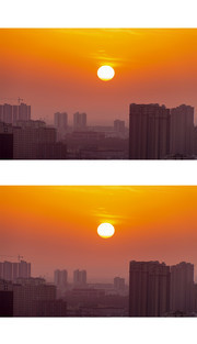 长焦拍摄城市日出风景图片素材